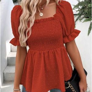 Orange peplum top